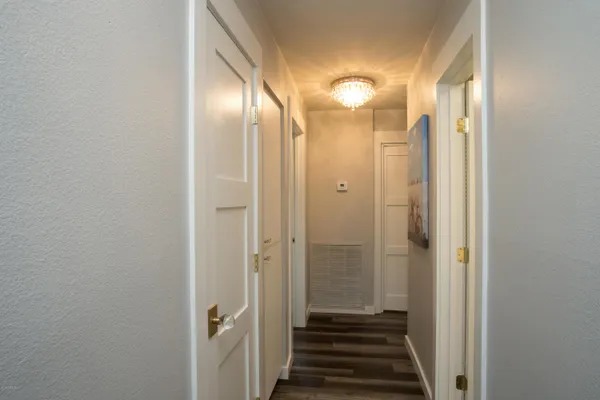a bathroom with a sink toilet and mirror