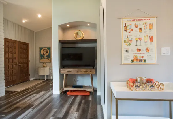 a bedroom with furniture and a fireplace