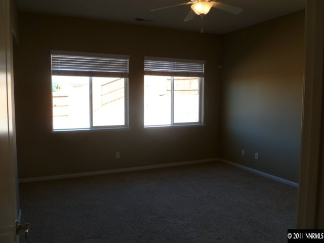 10122 Golden Spur Court Reno, NV 89521 - Photo 5 of 13 a view of an empty room with a window