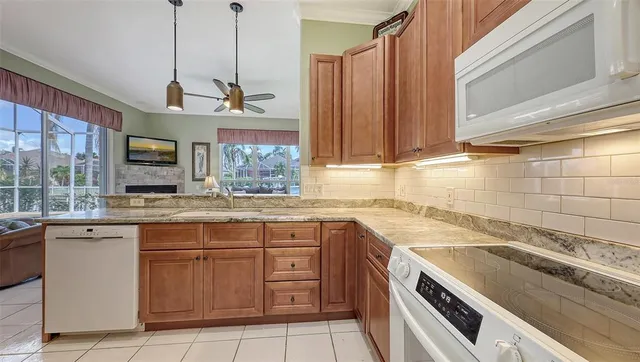 a bedroom with a bed and a dresser with mirror