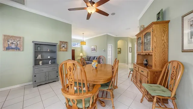 a view of a livingroom with furniture and a window