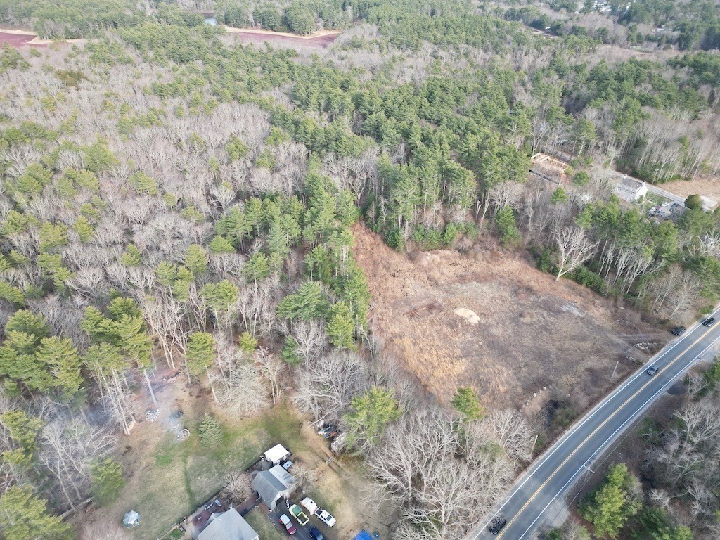 0 Palmer Road Plympton, MA 02367 - Photo 8 of 15 a view of a yard with a wooden fence