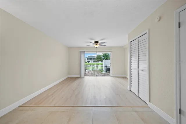 a view of a livingroom with a washer and dryer