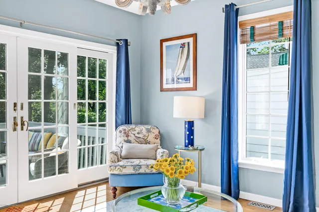 a living room with furniture and window
