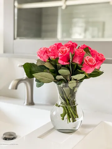 a vase of flowers sitting on a table