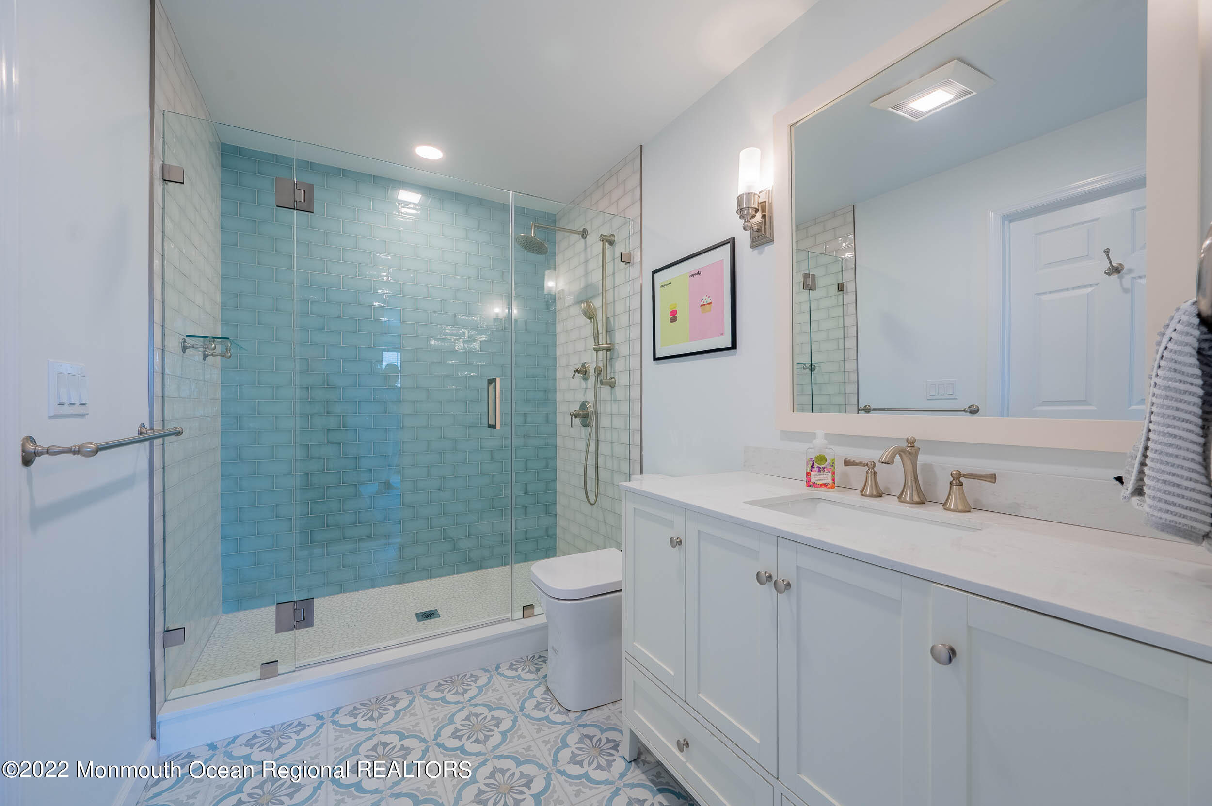 405 Salem Avenue, Unit SUMMER Spring Lake, NJ 07762 - Photo 27 of 46 a bathroom with a double vanity sink toilet and shower
