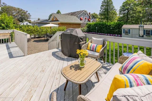 a view of a patio with furniture