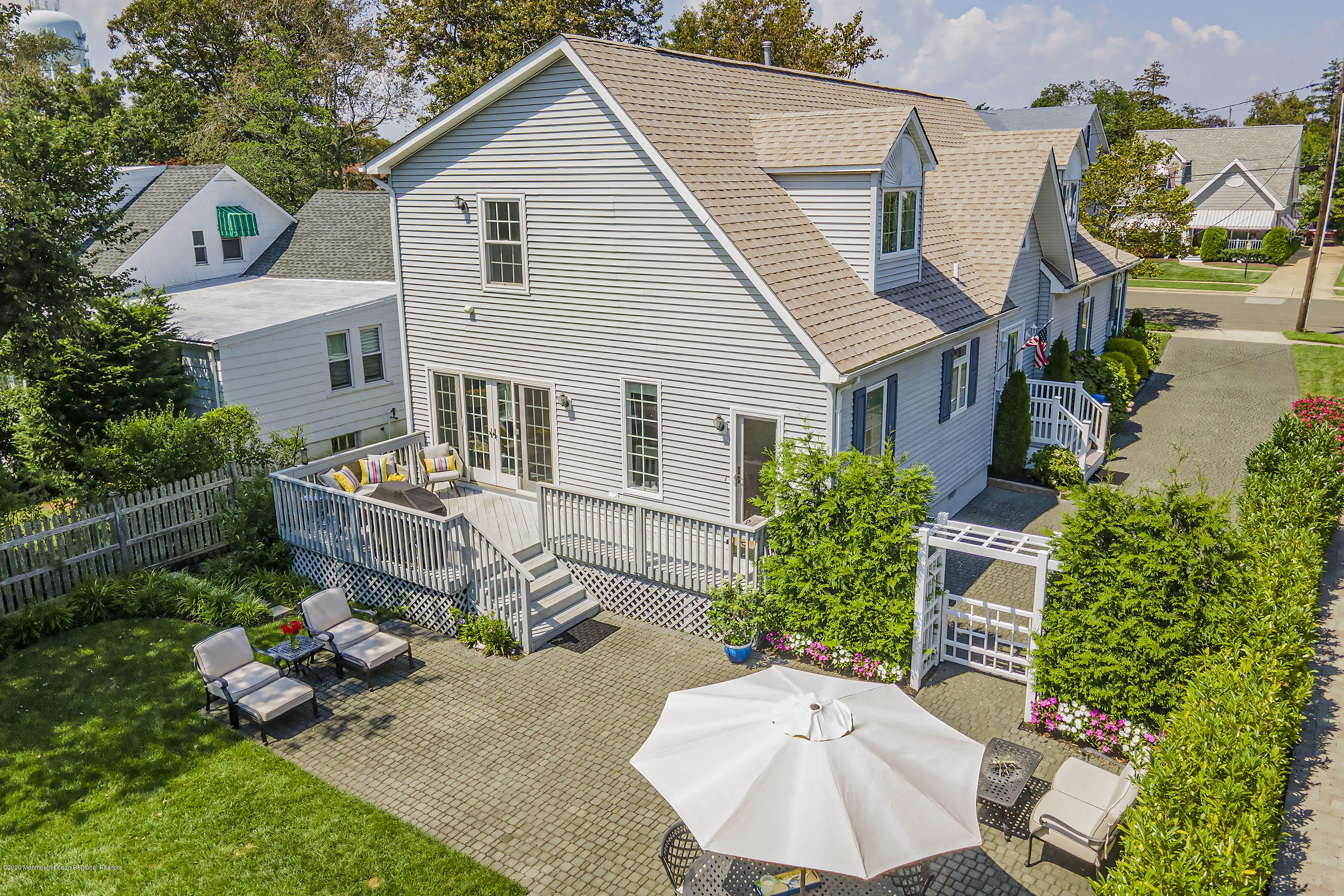 405 Salem Avenue, Unit SUMMER Spring Lake, NJ 07762 - Photo 39 of 46 a view of a dinning table and chairs in patio