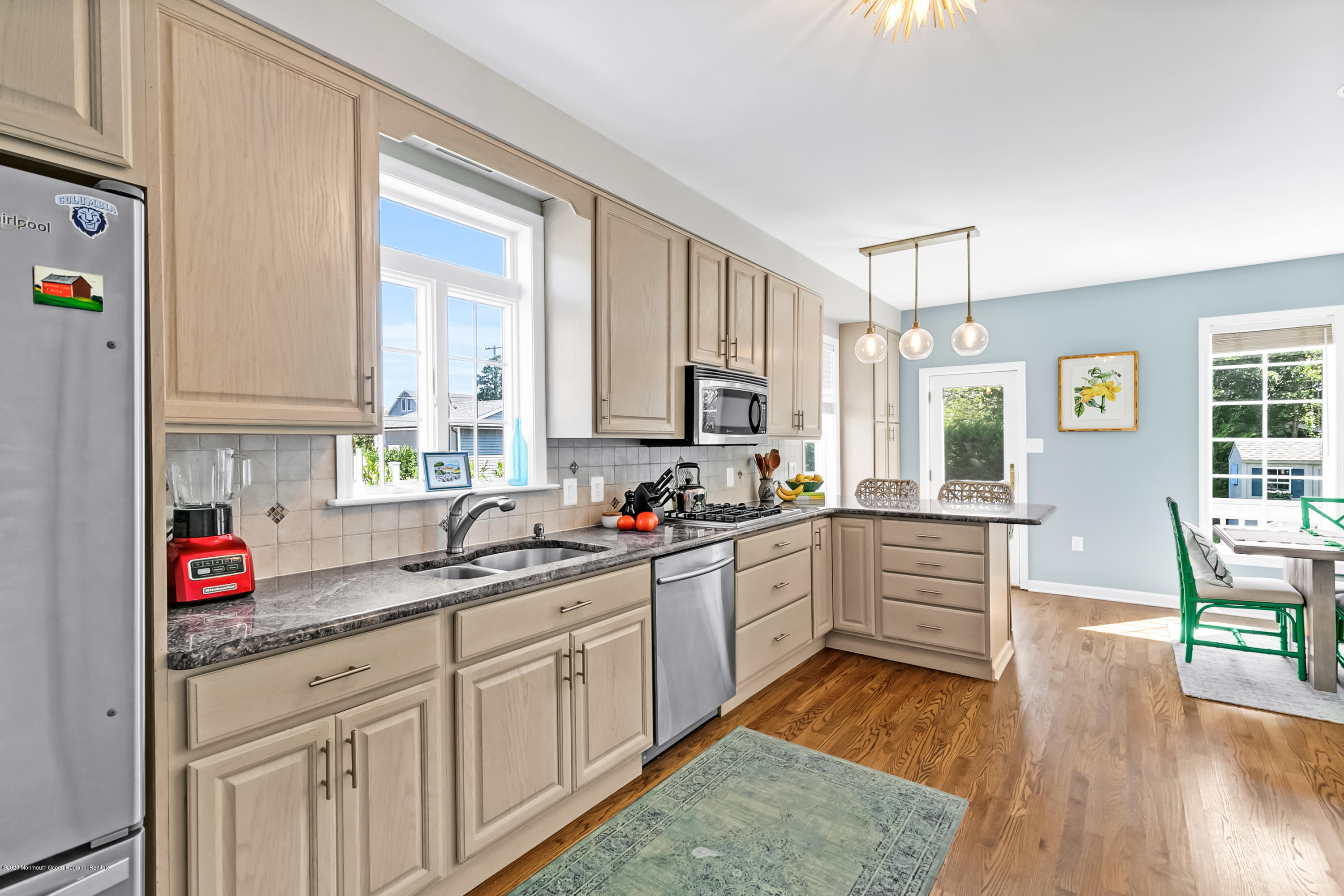 405 Salem Avenue, Unit SUMMER Spring Lake, NJ 07762 - Photo 7 of 46 a kitchen with sink cabinets and wooden floor