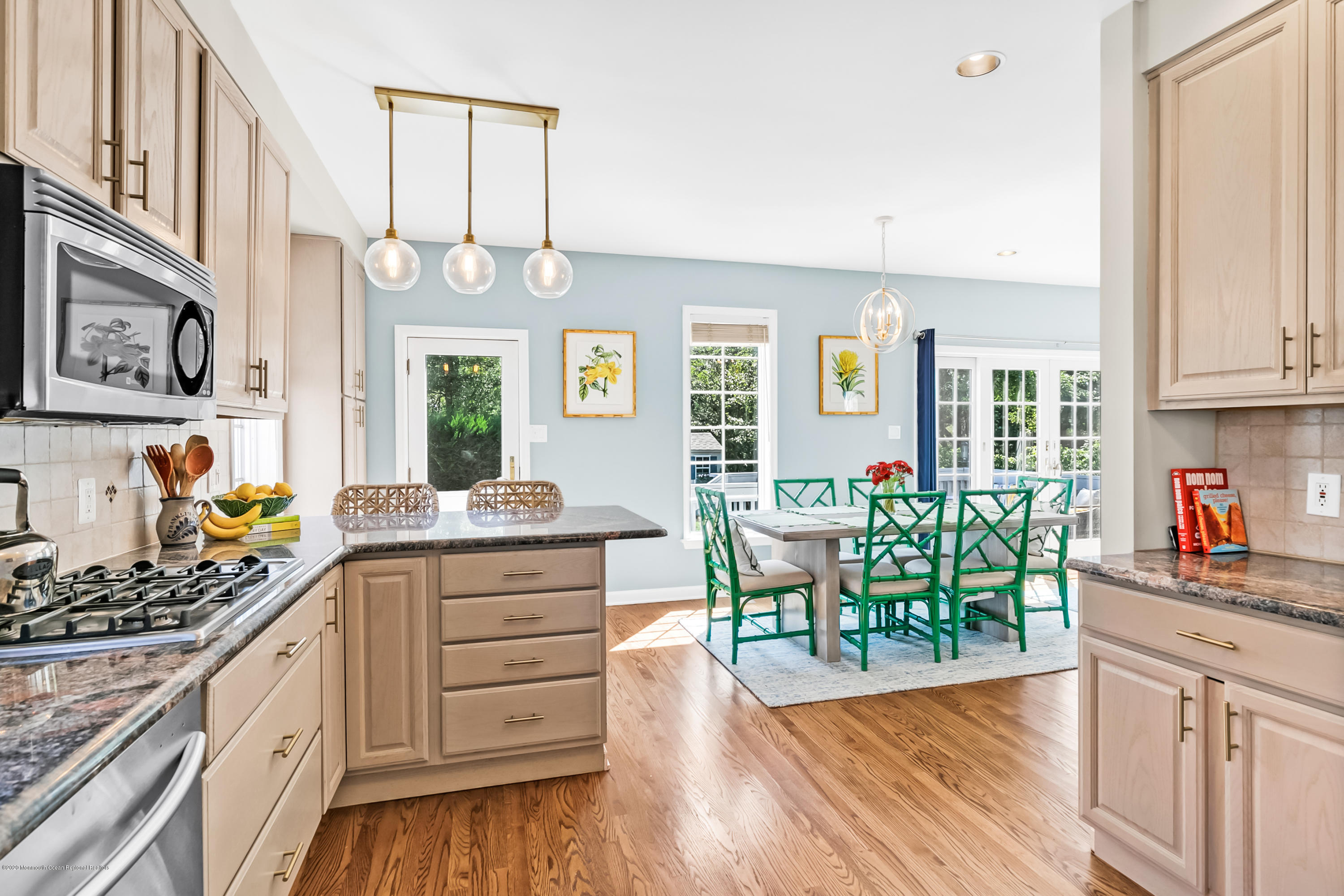405 Salem Avenue, Unit SUMMER Spring Lake, NJ 07762 - Photo 8 of 46 a kitchen with granite countertop cabinets a dining table and chairs