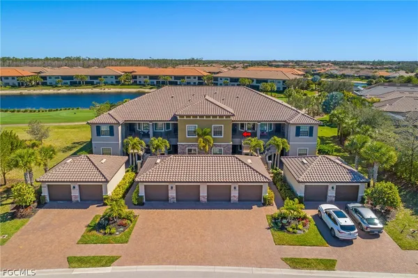 a view of house with garden space and ocean view