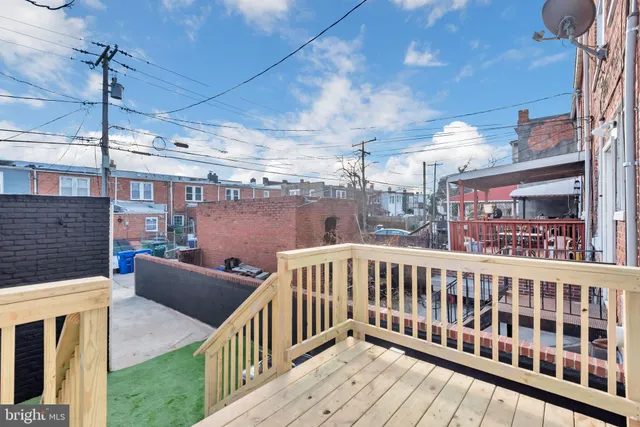 a view of balcony with furniture