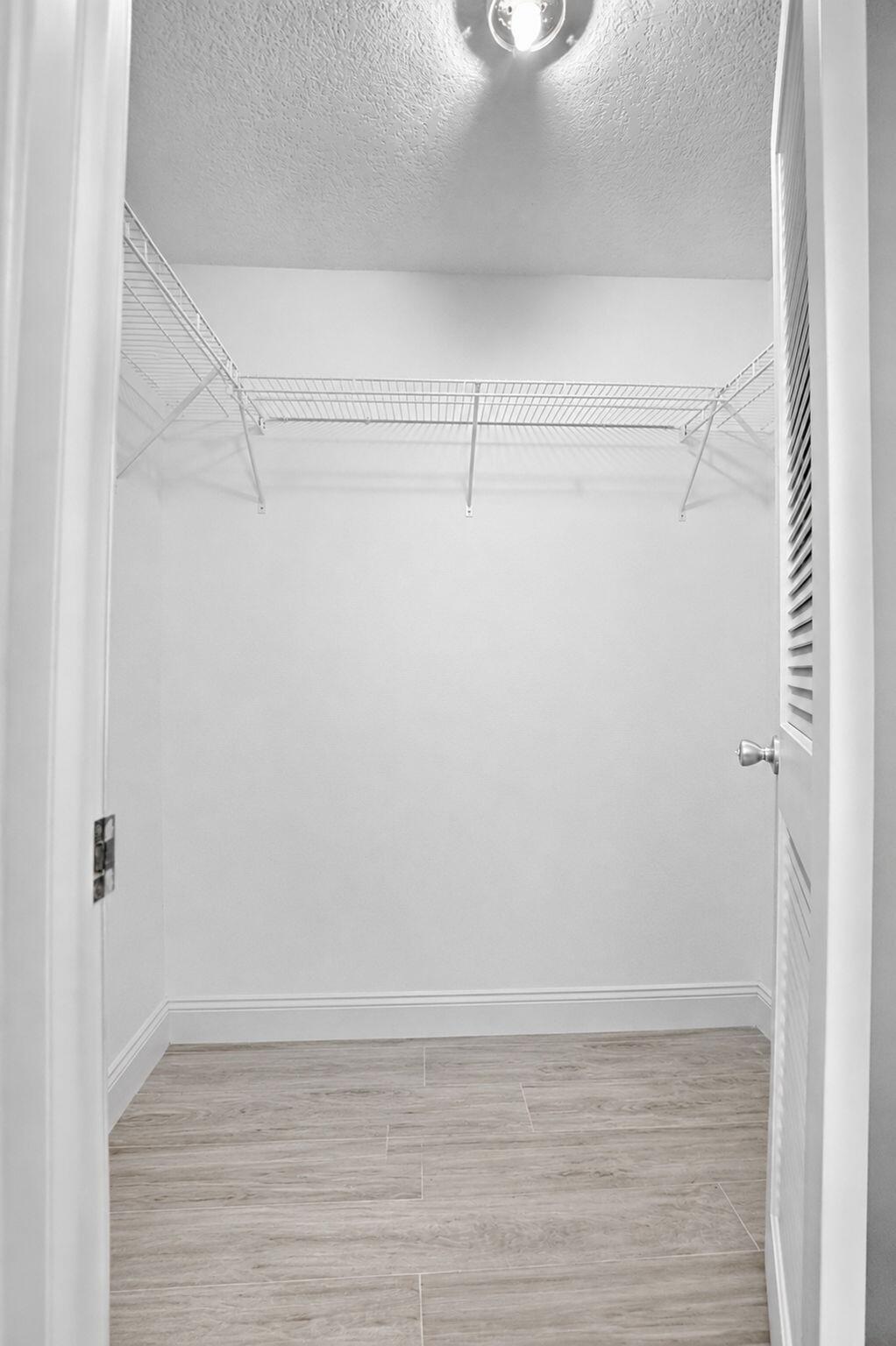 8681 Boca Drive, Unit 20 Boca Raton, FL 33433 - Photo 26 of 54 Walk-in Closet