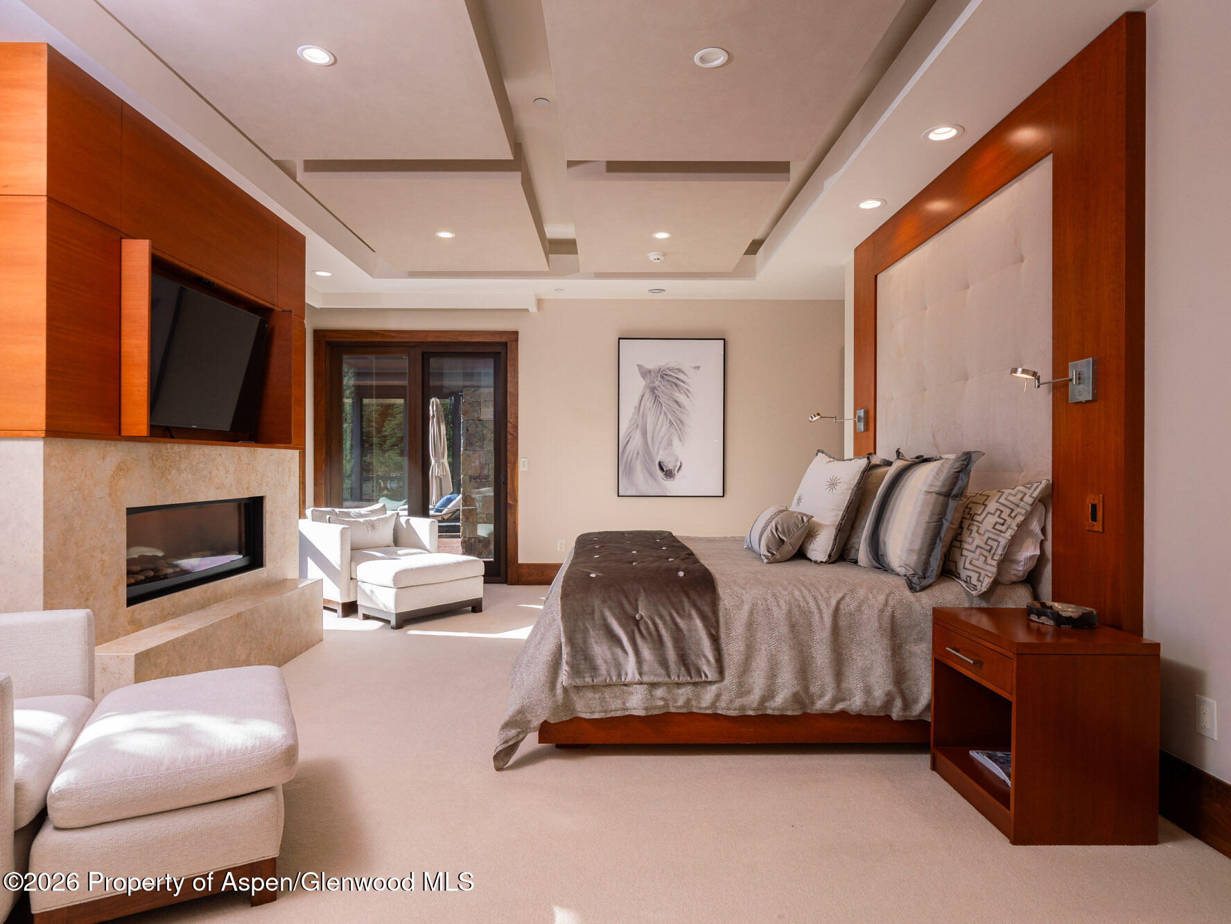 750 South Starwood Road Aspen, CO 81612 - Photo 12 of 39 a bedroom with a bed couch and fireplace