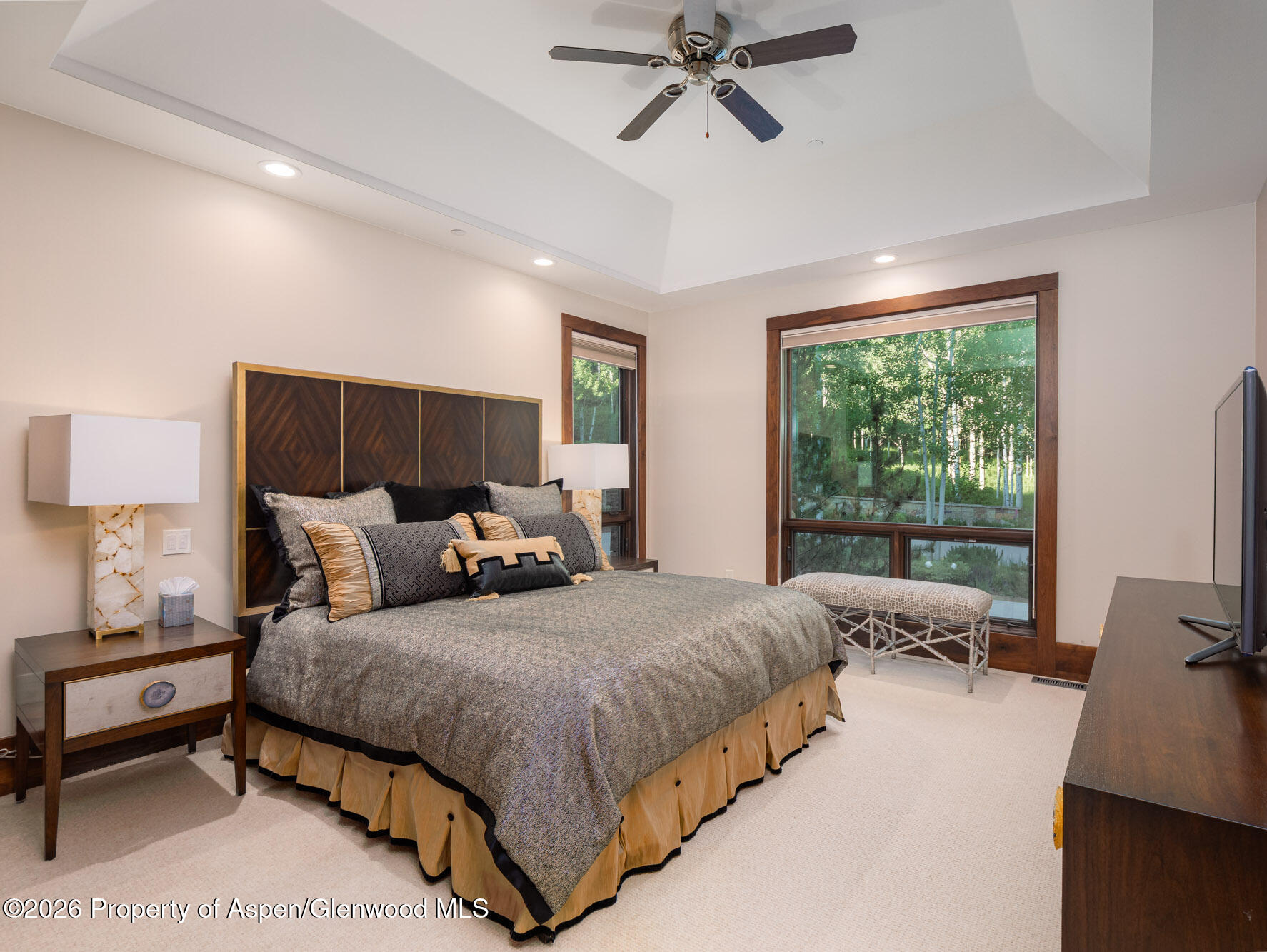 750 South Starwood Road Aspen, CO 81612 - Photo 24 of 39 a bedroom with a bed and large windows