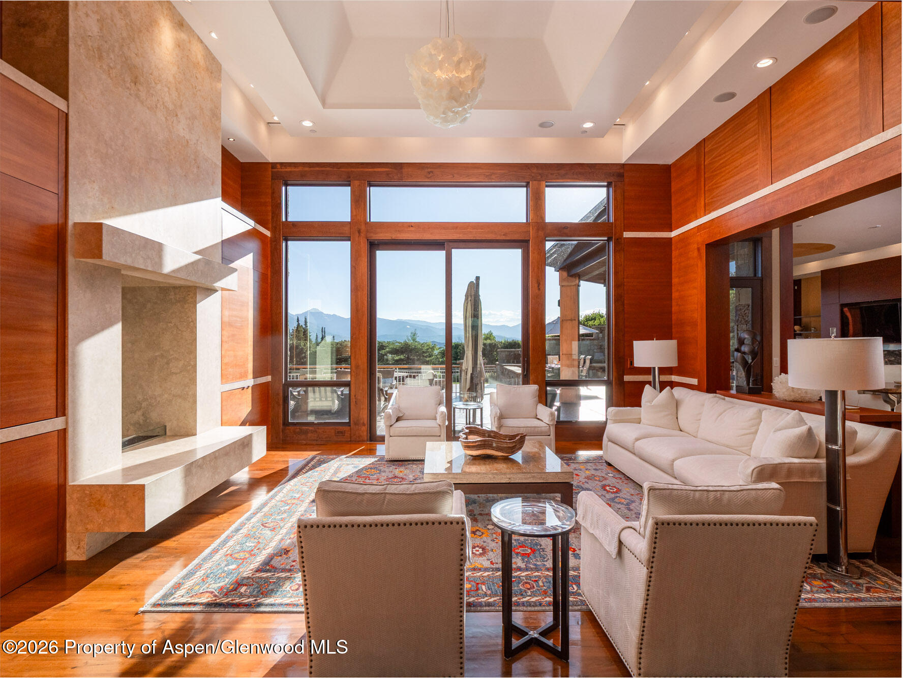 750 South Starwood Road Aspen, CO 81612 - Photo 5 of 39 a living room with furniture and a large window
