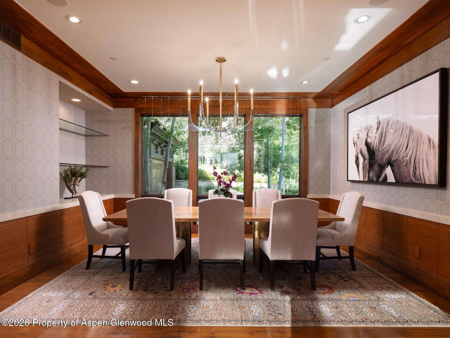 750 South Starwood Road Aspen, CO 81612 - Photo 7 of 39 a dining room with furniture a rug and a chandelier