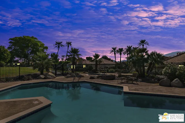 a view of a lake with a house