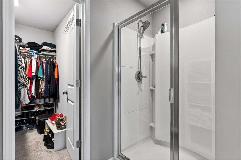 3182 Meadowstone Lane Southwest Atlanta, GA 30331 - Photo 21 of 32 a bathroom with a shower and a mirror