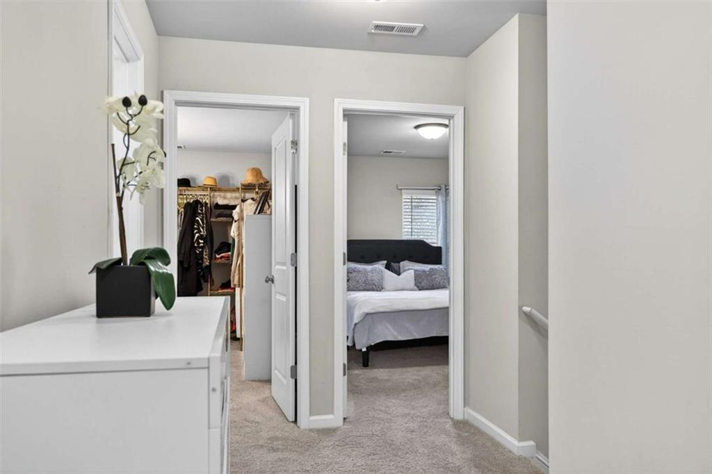 3182 Meadowstone Lane Southwest Atlanta, GA 30331 - Photo 22 of 32 a view of bedroom with a bed and a closet