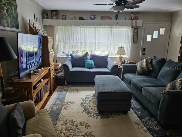 a kitchen with a stove and a refrigerator