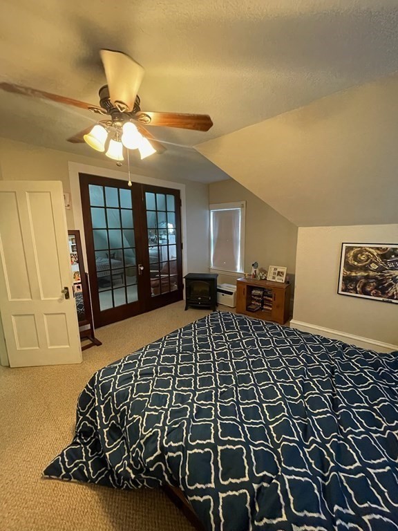 102-104 Allyn Street Holyoke, MA 01040 - Photo 21 of 26 a bedroom with a large bed and a window