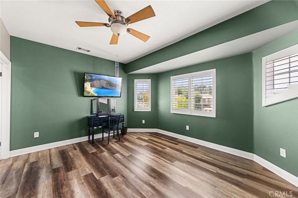 38136 Butterfly Court Yucaipa, CA 92399 - Photo 53 of 71 a bedroom with a bed and a window