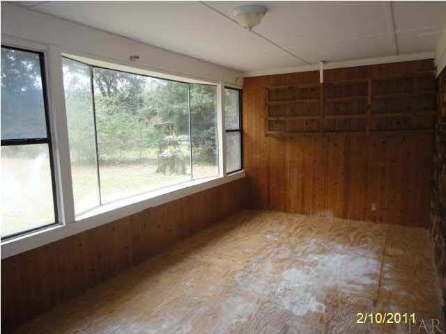 7512 Stagecoach Road Pensacola, FL 32526 - Photo 13 of 19 Sunroom
