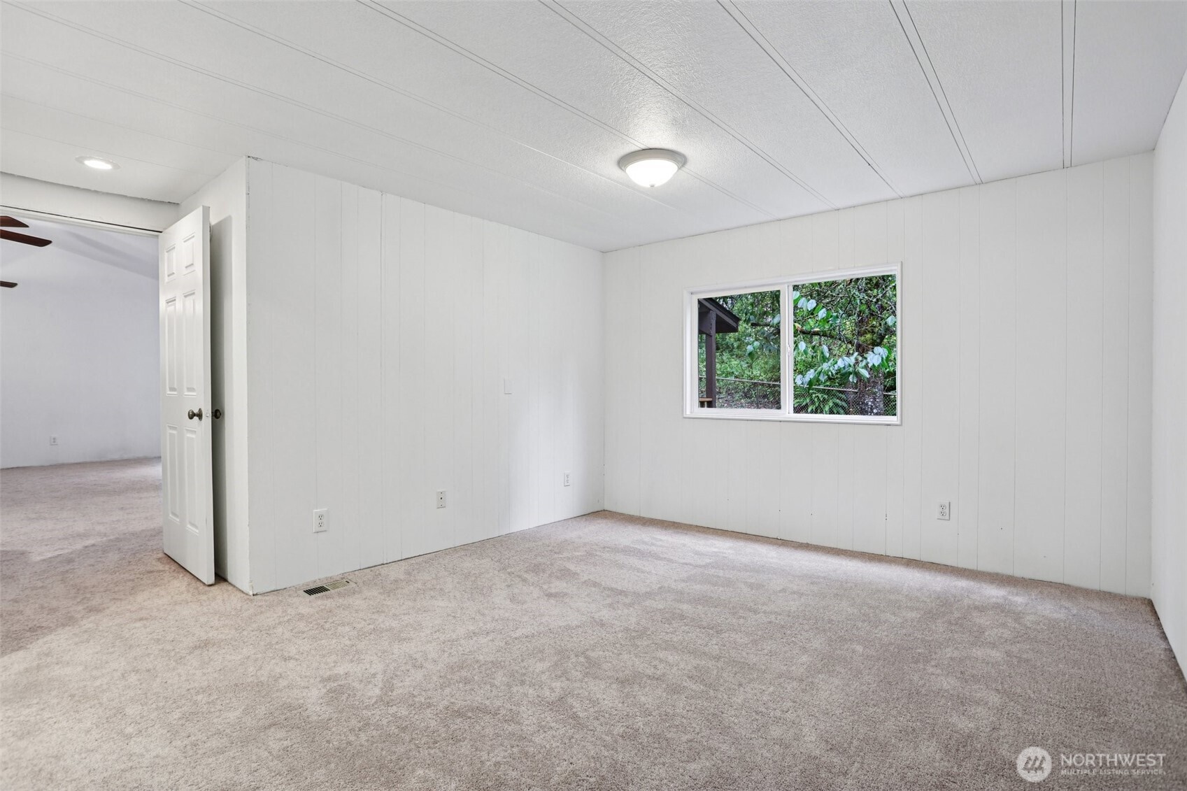 34408 Northeast 111th Street Carnation, WA 98014 - Photo 12 of 34 an empty room with windows