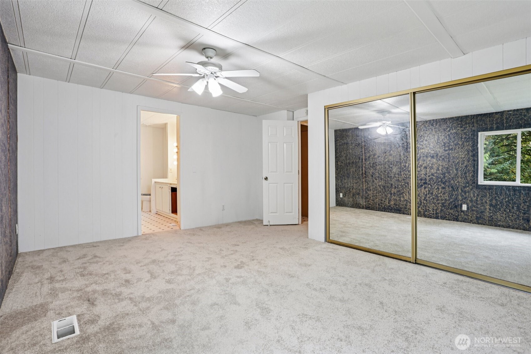 34408 Northeast 111th Street Carnation, WA 98014 - Photo 14 of 34 a view of an empty room with a chandelier fan