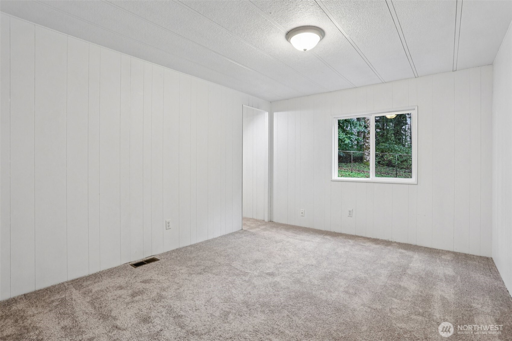 34408 Northeast 111th Street Carnation, WA 98014 - Photo 16 of 34 an empty room with a window