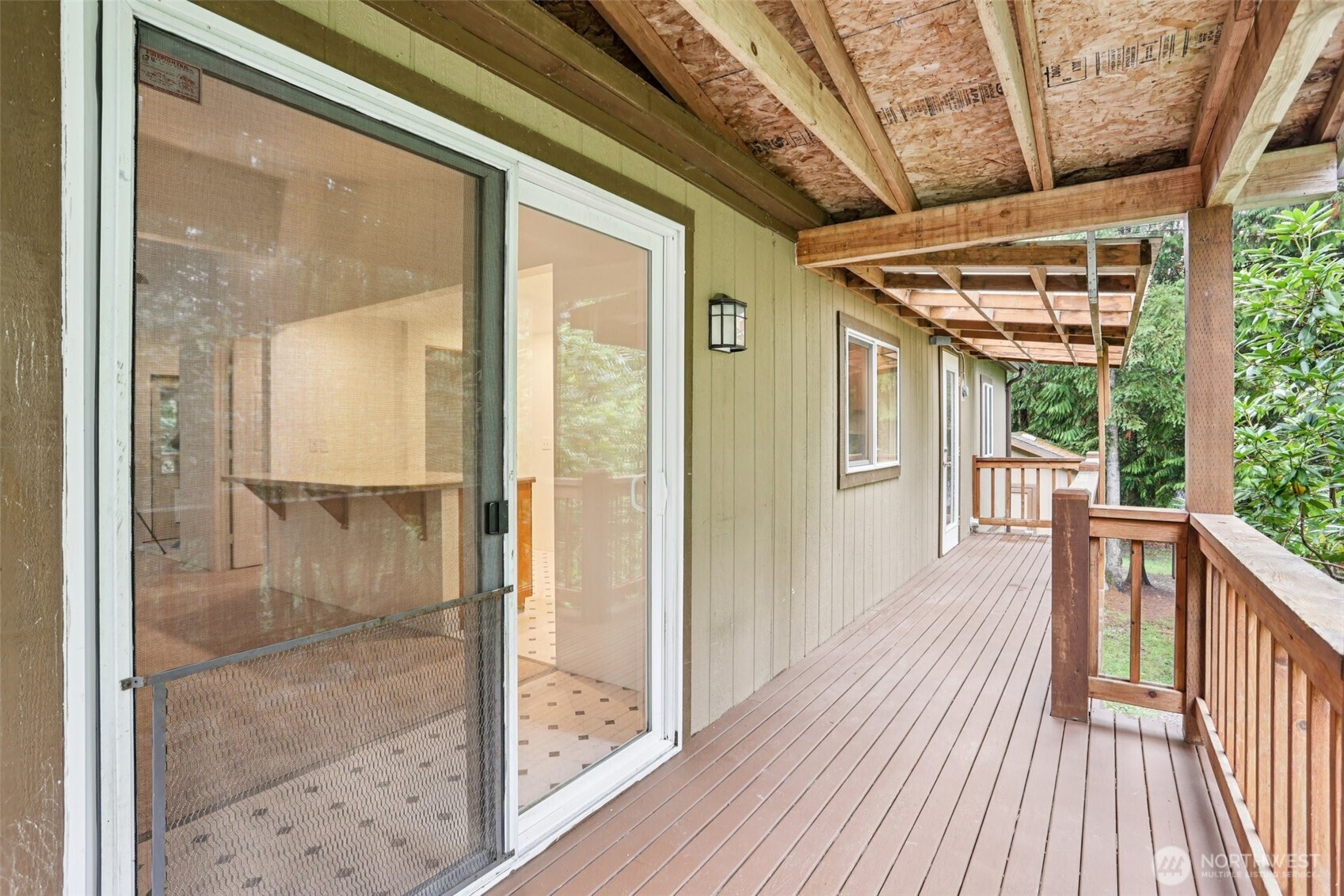 34408 Northeast 111th Street Carnation, WA 98014 - Photo 21 of 34 a view of a porch with wooden floor and outdoor space