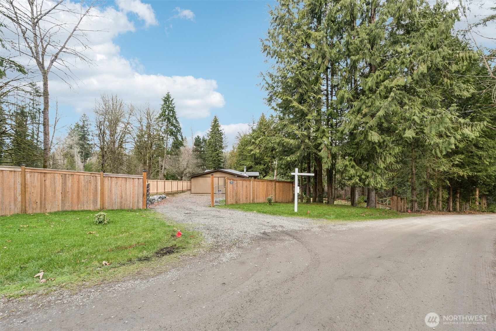 34408 Northeast 111th Street Carnation, WA 98014 - Photo 25 of 34 a view of a backyard with large trees