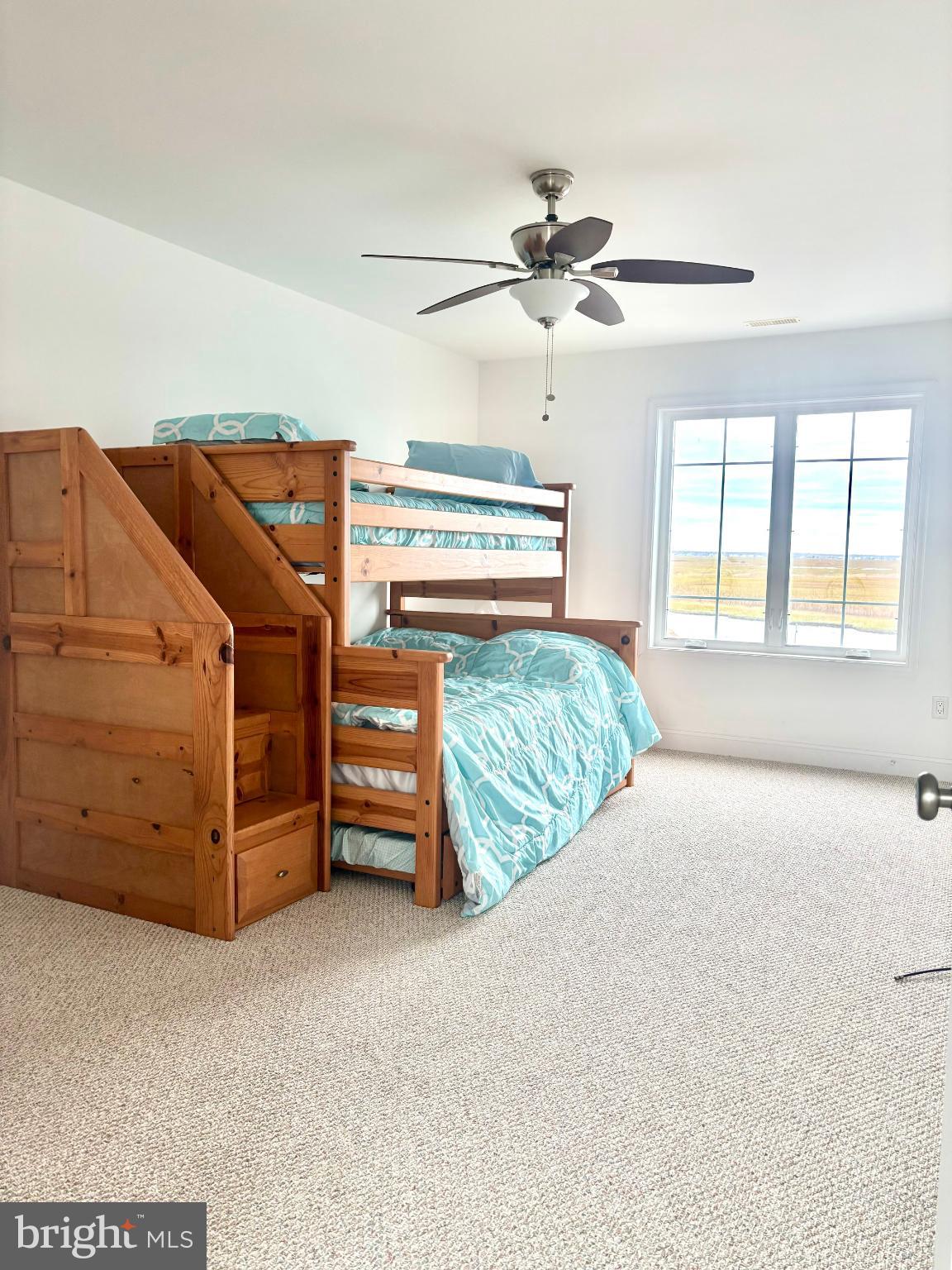 448 Dock Road West Creek, NJ 08092 - Photo 15 of 39 a bed room with a bed and a chair