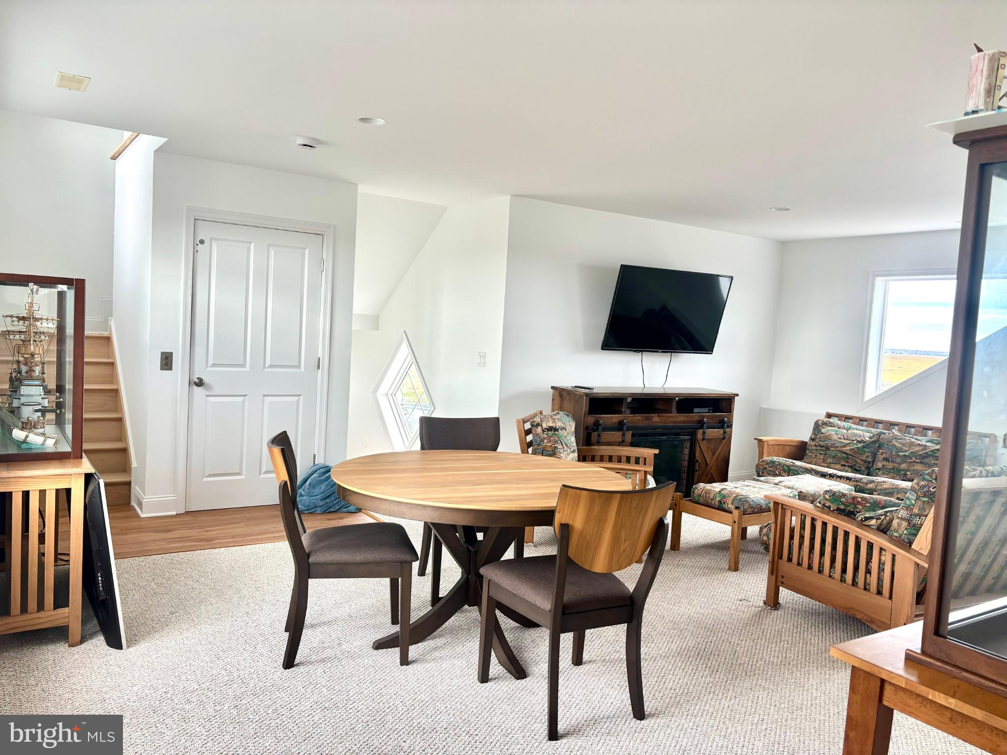 448 Dock Road West Creek, NJ 08092 - Photo 23 of 39 a dining room with furniture and wooden floor