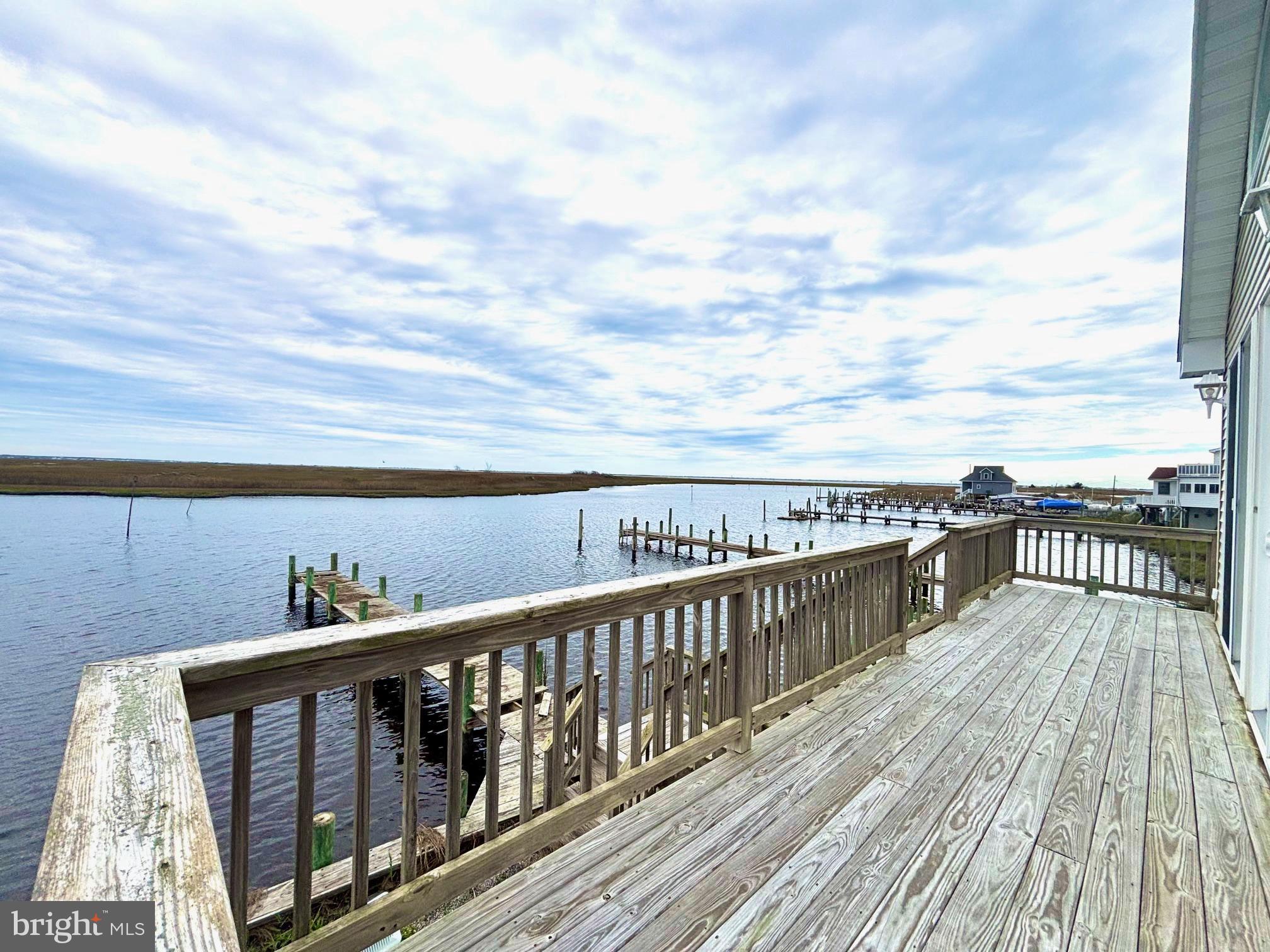 448 Dock Road West Creek, NJ 08092 - Photo 34 of 39 a view of roof deck with wooden floor and fence