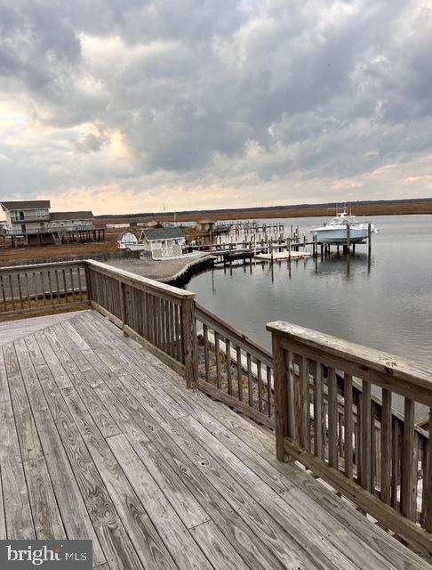 448 Dock Road West Creek, NJ 08092 - Photo 36 of 39 a view of roof deck with two chairs and wooden floor