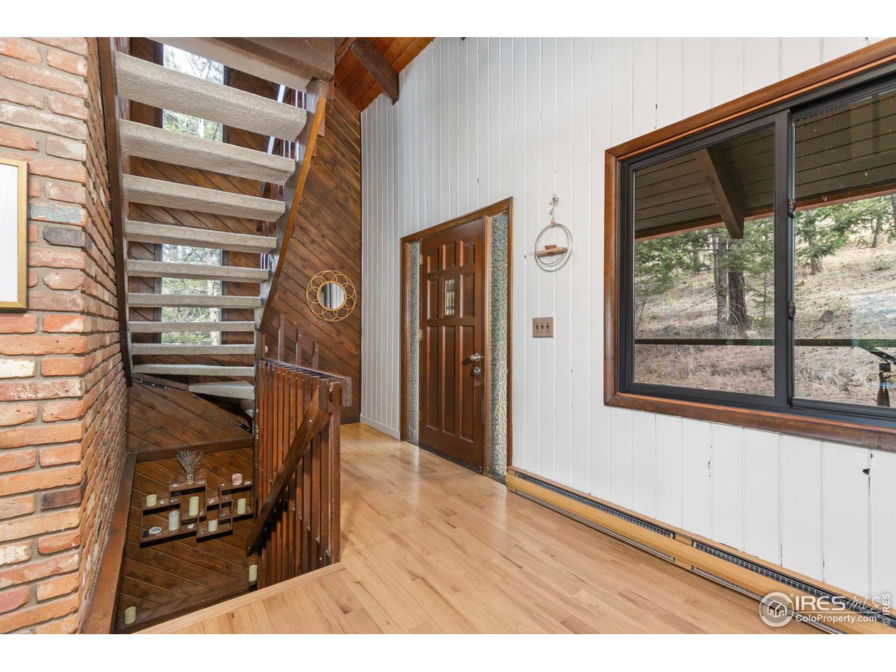 661 Peakview Road Boulder, CO 80302 - Photo 13 of 39 Traditional front door with stairs to upper and lower levels