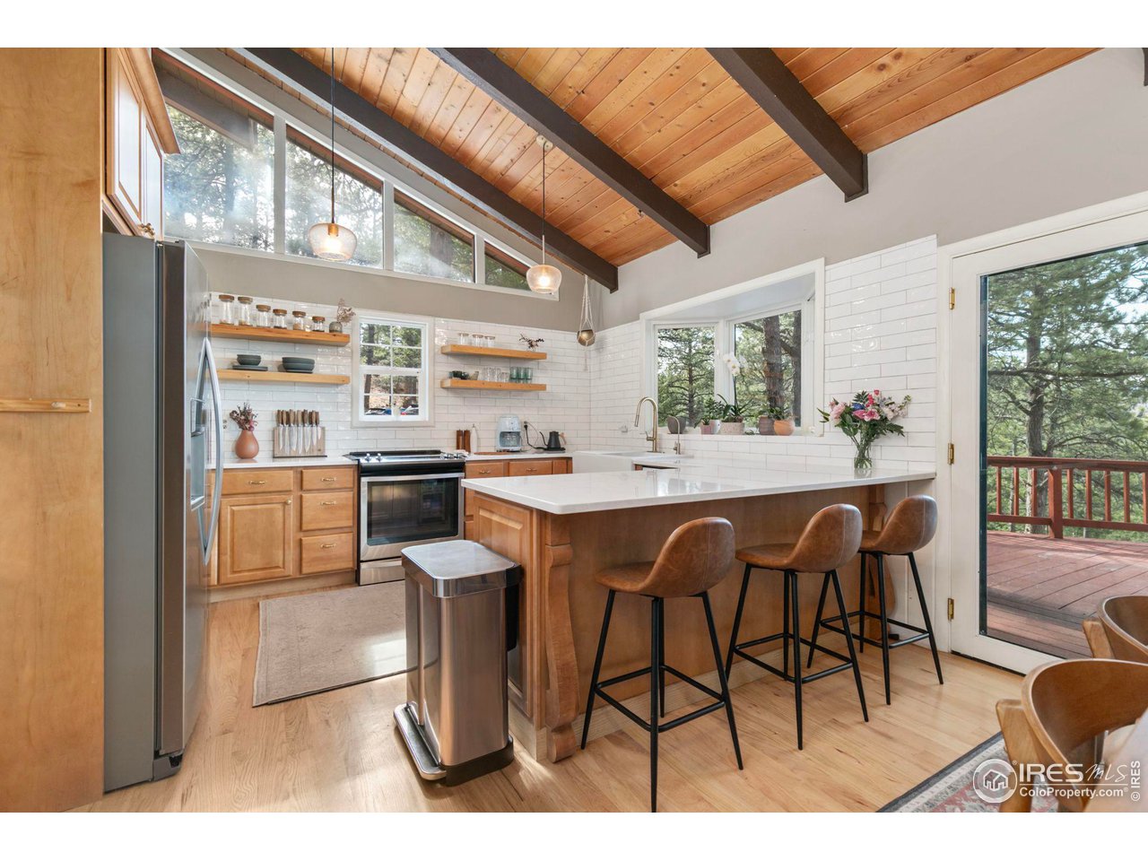 661 Peakview Road Boulder, CO 80302 - Photo 2 of 39 Soaring cathedral ceiling in the kitchen brings in lots of natural light