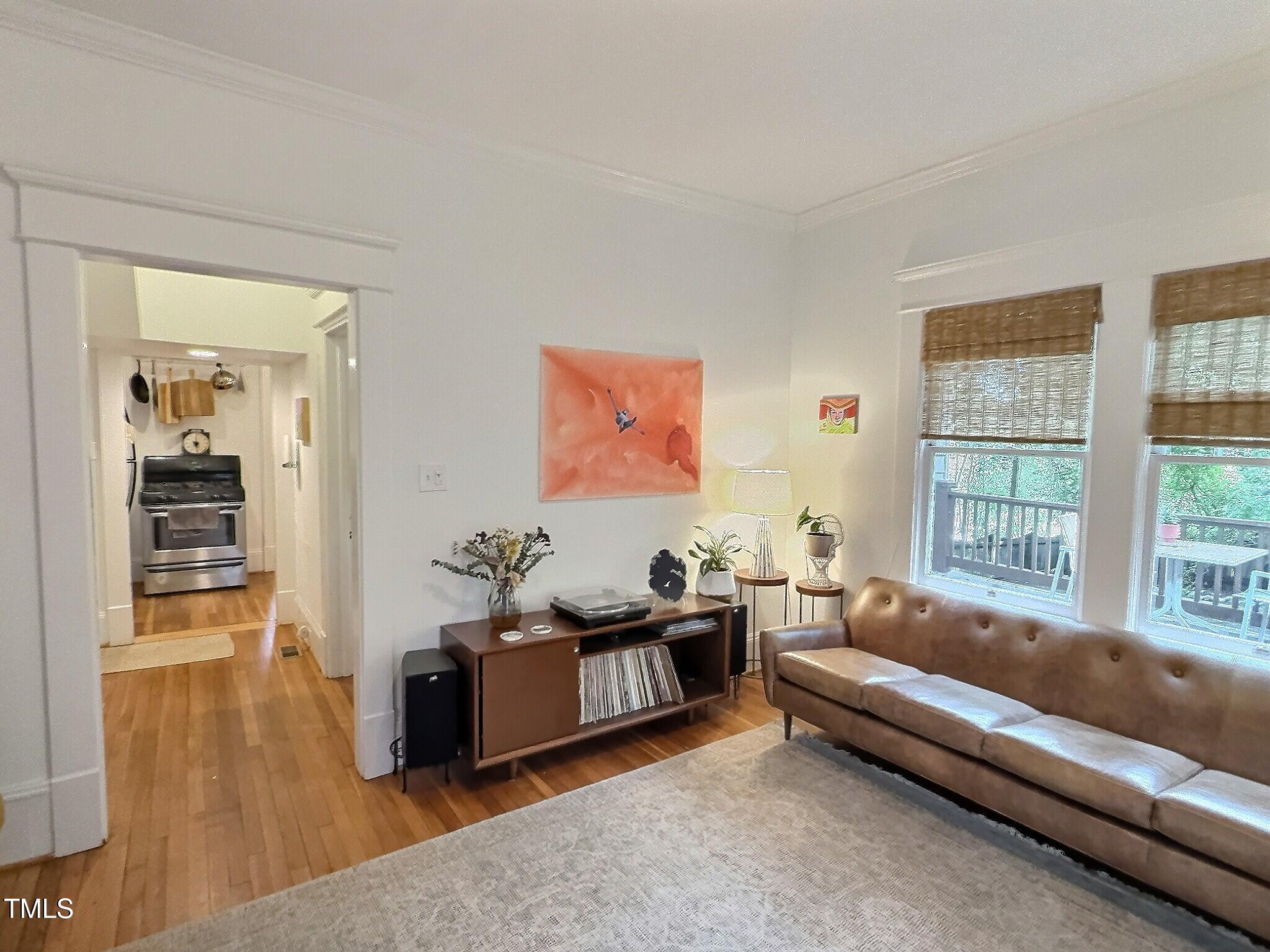 901 West Markham Avenue Durham, NC 27701 - Photo 12 of 38 a living room with furniture and a large window