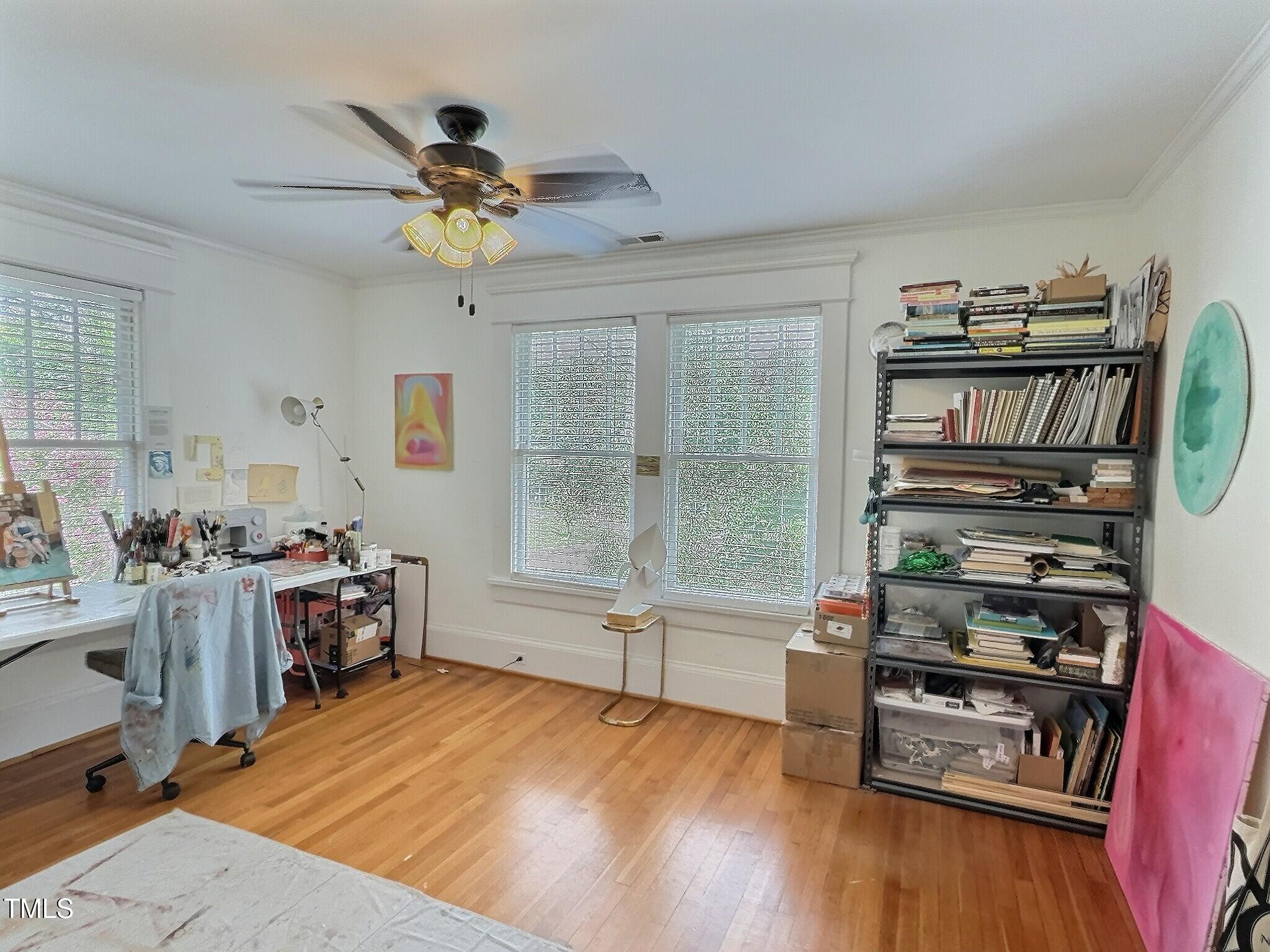 901 West Markham Avenue Durham, NC 27701 - Photo 23 of 38 a living room with hard wood floors and a window