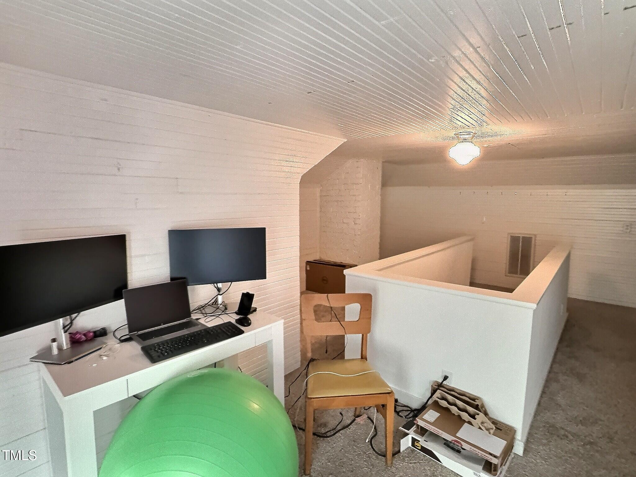 901 West Markham Avenue Durham, NC 27701 - Photo 37 of 38 a work room with furniture and a flat screen tv