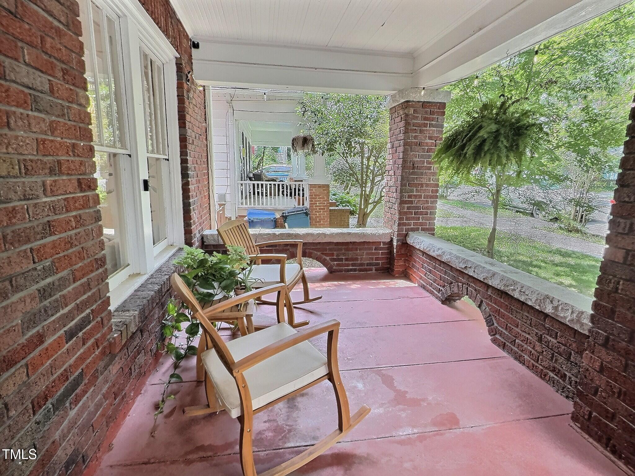 901 West Markham Avenue Durham, NC 27701 - Photo 4 of 38 a swimming pool with outdoor seating