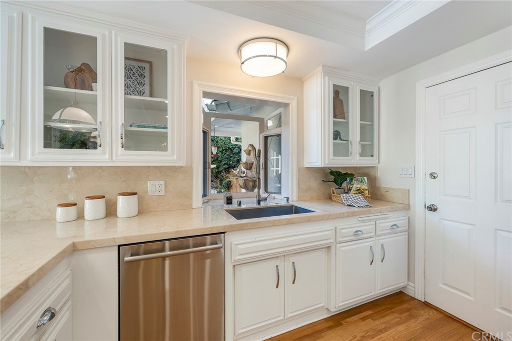 806 Adlena Drive Fullerton, CA 92833 - Photo 11 of 37 a kitchen with cabinets appliances and a window