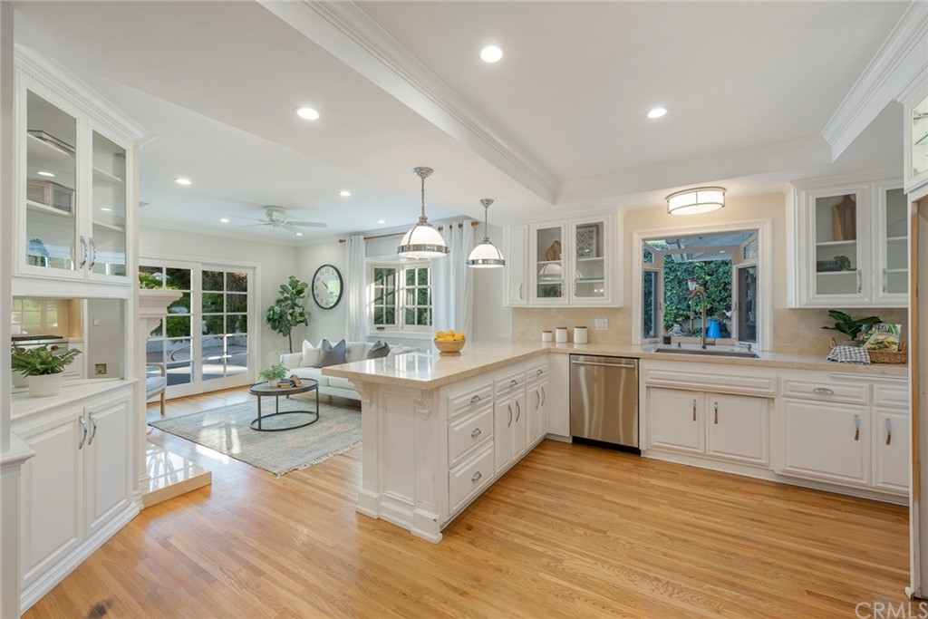 806 Adlena Drive Fullerton, CA 92833 - Photo 13 of 37 a large kitchen with kitchen island white cabinets and stainless steel appliances