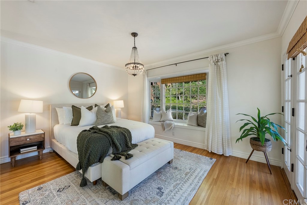 806 Adlena Drive Fullerton, CA 92833 - Photo 20 of 37 a bed room with a bed and a potted plant