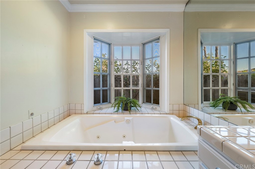 806 Adlena Drive Fullerton, CA 92833 - Photo 23 of 37 a bath tub sitting in a bathroom next to a window