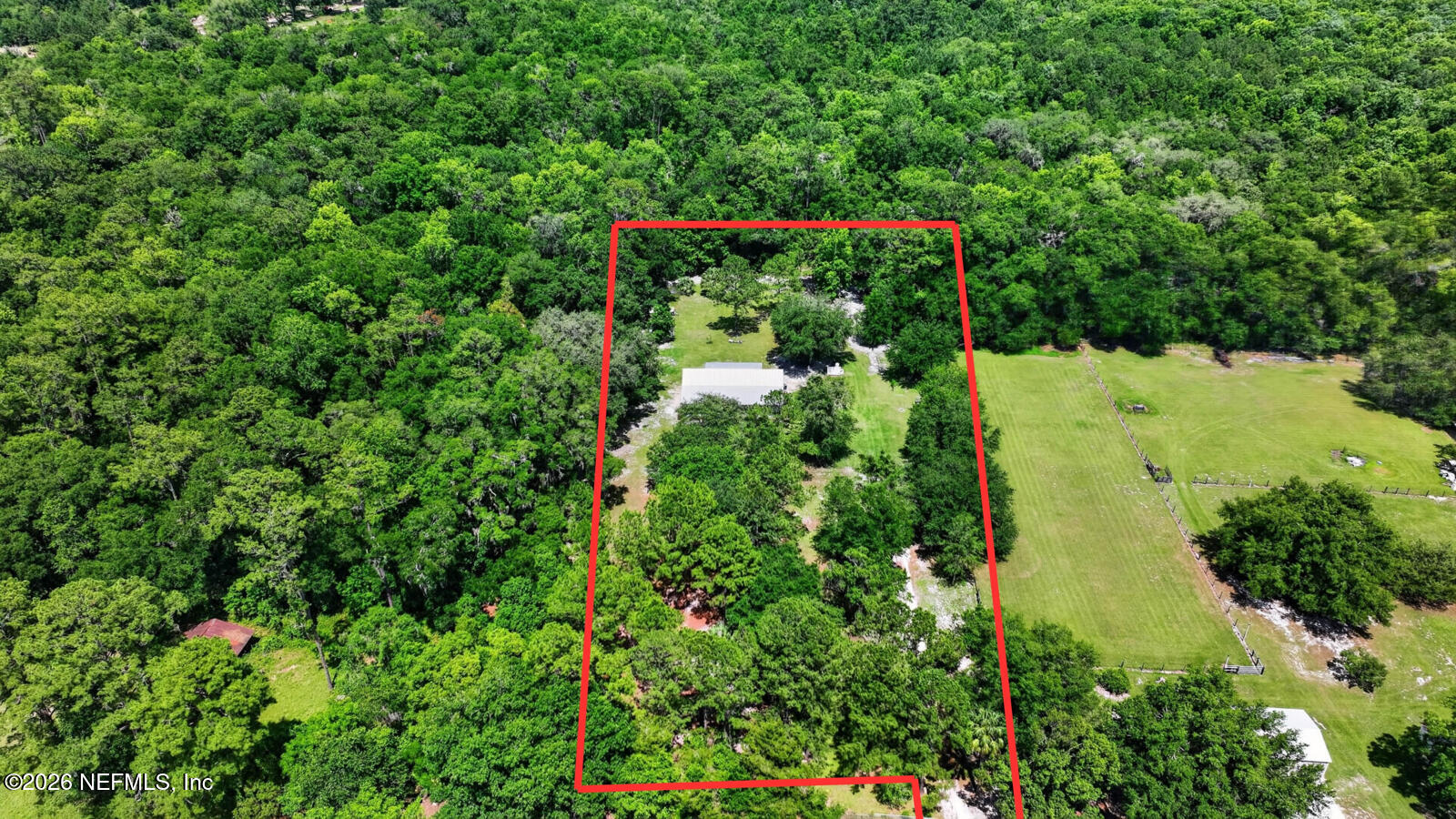 264 Peniel Church Road Palatka, FL 32177 - Photo 41 of 48 an aerial view of a house with a yard