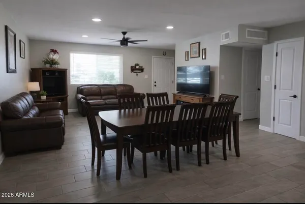a view of a dining room with furniture