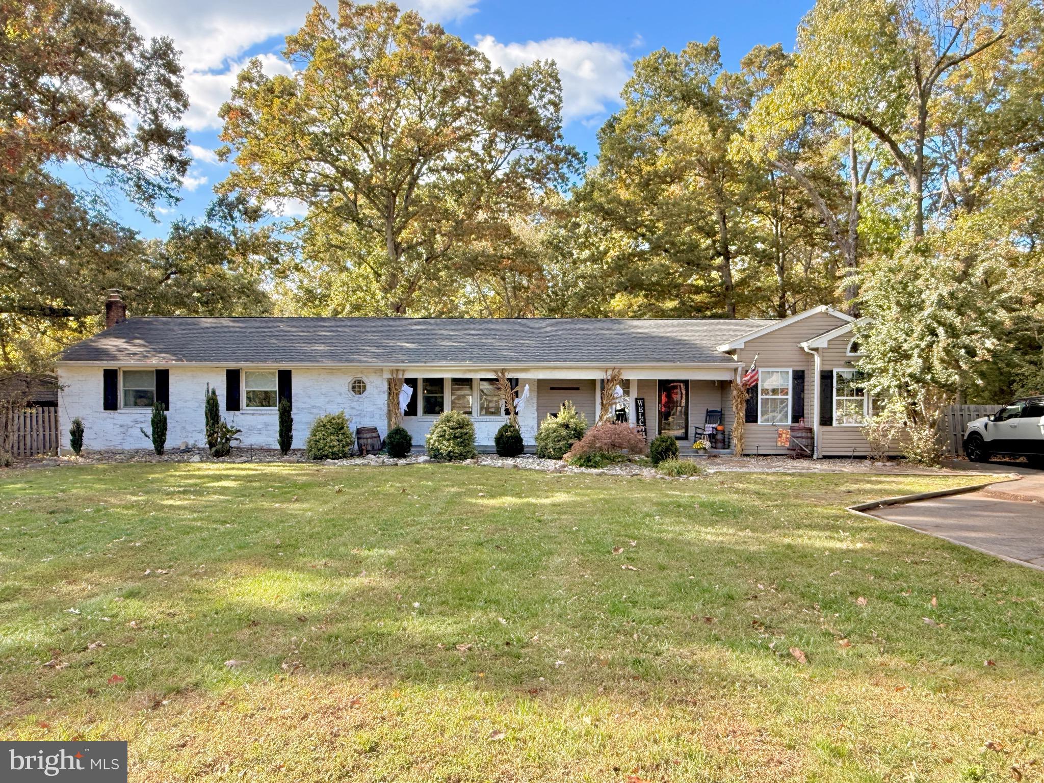 1325 Janvier Road Williamstown, NJ 08094 - Photo 1 of 32 a front view of a house with a garden